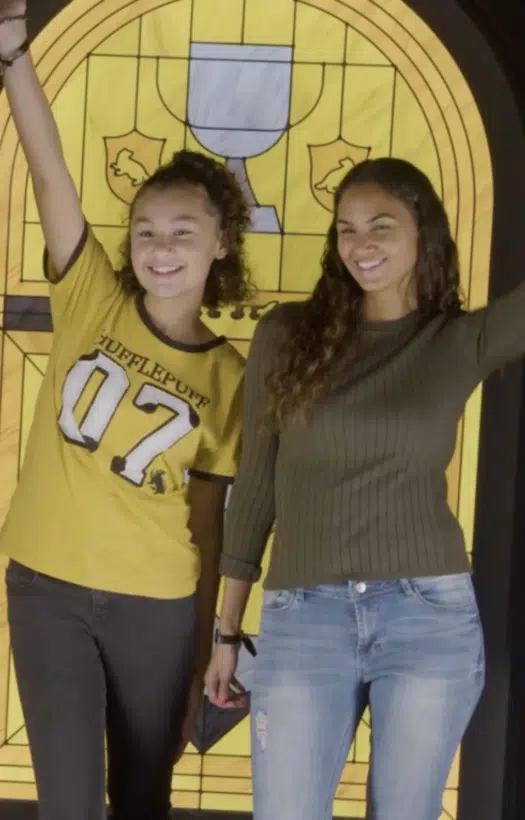 women enjoying the Harry Potter exhibit